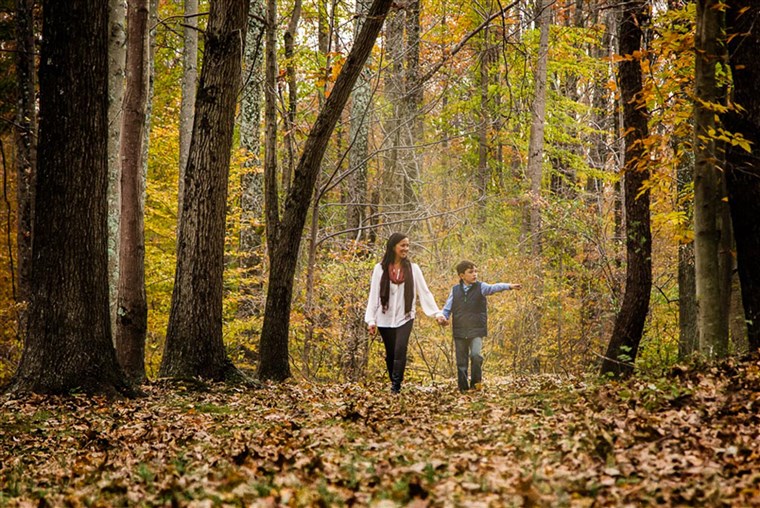 וויאט recommends finding areas other than the pumpkin patch to use as a backdrop for your fall photos. Think orchards, fields and forests.