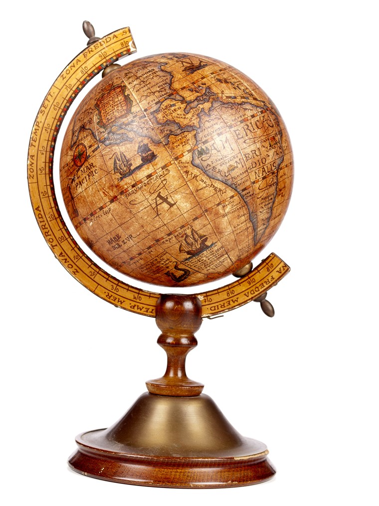 एक old brown vintage globe on a small stand