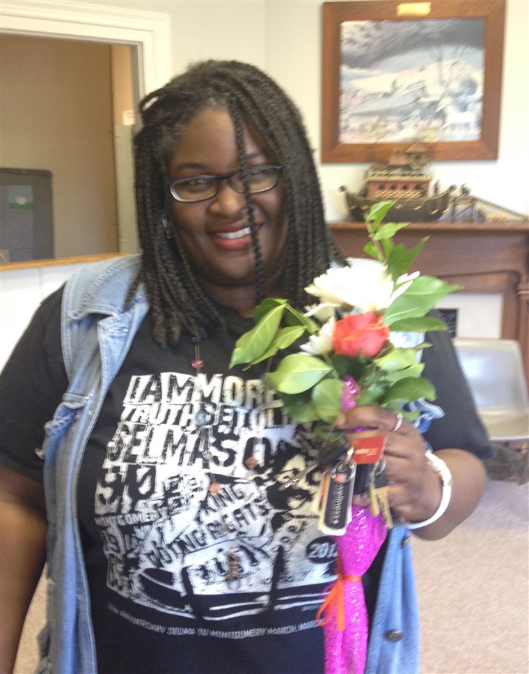 דרלה Brown, one of the organization's adopted moms, with her Mother's Day flowers.