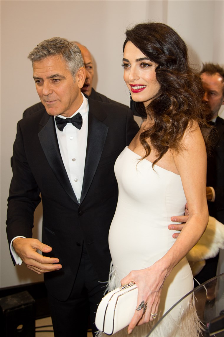 जॉर्ज and Amal Clooney