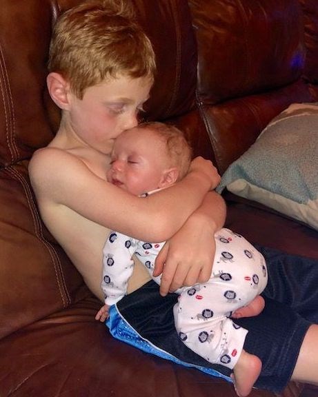मिकी is an amazing big brother to baby Jake.