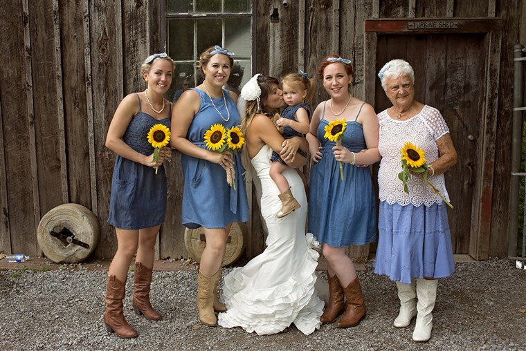ה bridesmaids all wore denim outfits and cowboy boots. 