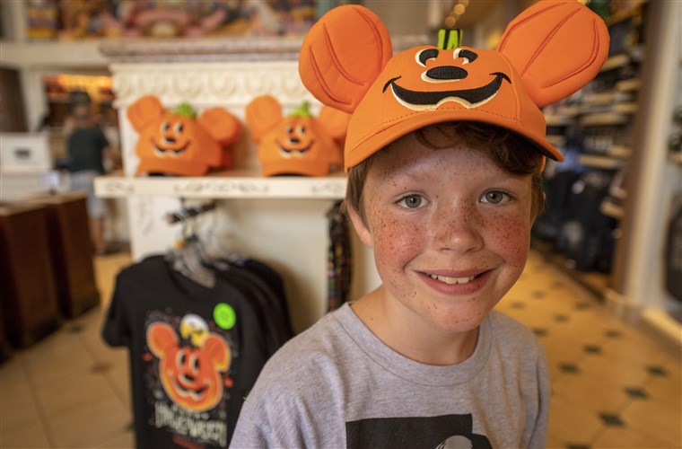 Iz light up trick-or-treat buckets to baseball hats, Miller says Mickey Mouse pumpkins play a large role in the 2023 Halloween merchandise line.