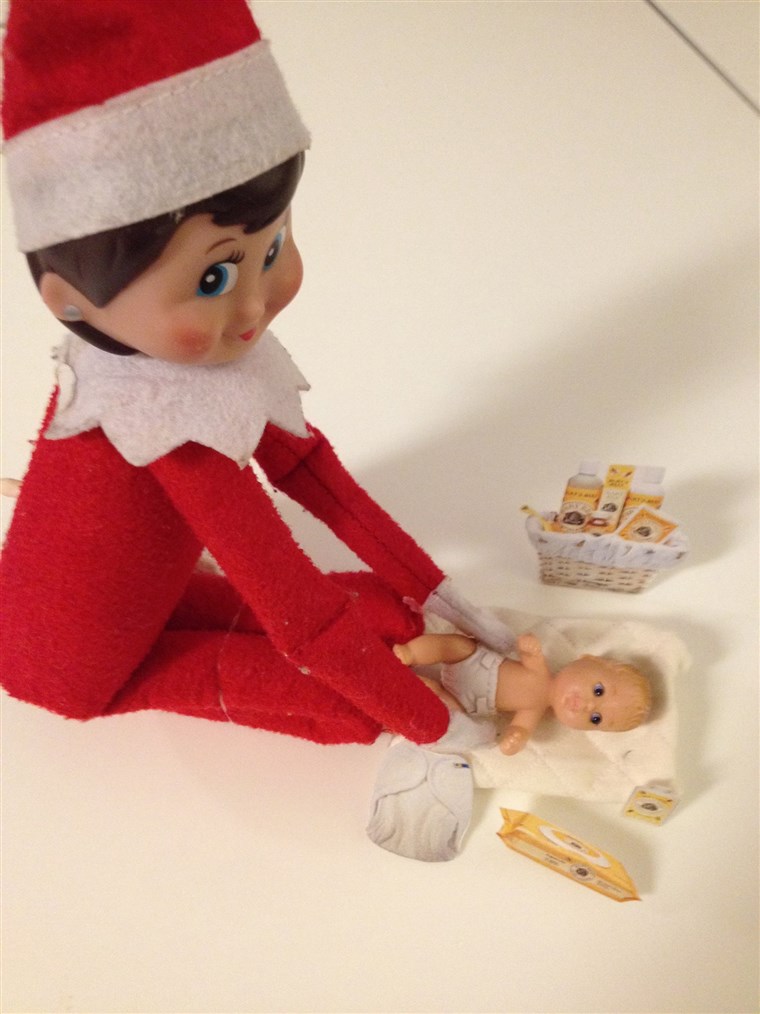  Elf changes baby doll diapers! 