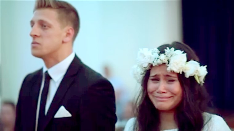 חתונה couple react emotionally to Maori haka dance being performed.