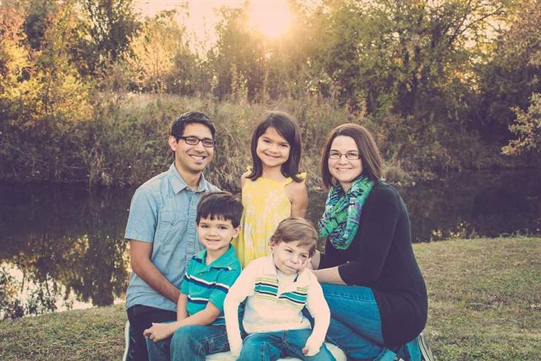 ה Delgado family: Mom and dad, Vanessa and Jason; Kenya, Jonah and Anton.