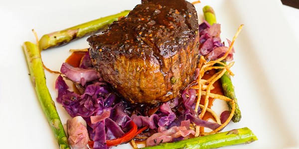 टिम Love's Easy Grilled Steak Stuffed with Roasted Garlic