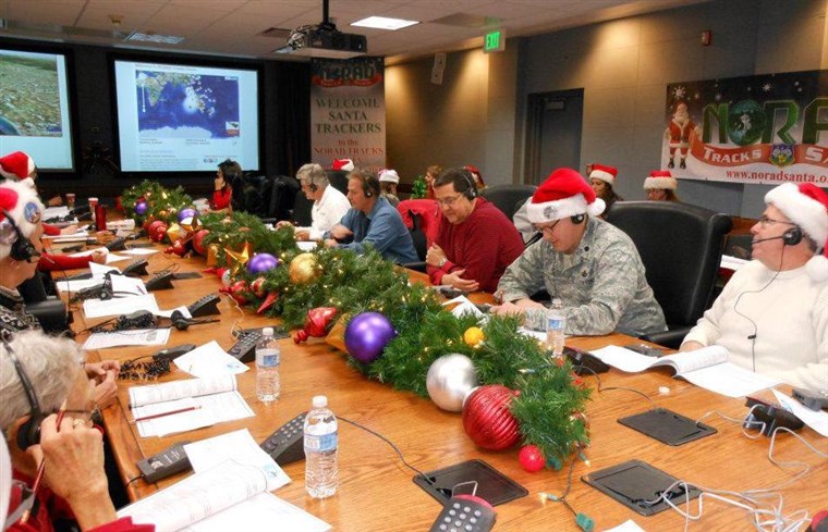Više than 1,500 volunteers gather on Christmas Eve to help with NORAD's tracking of Santa's flight each year.