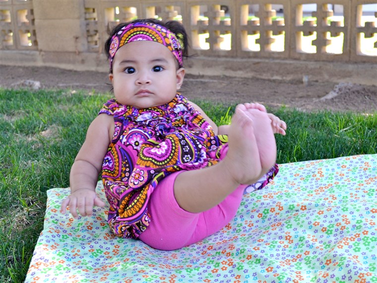 Gerber baby contest winner Mary Jane Montoya strikes a pose for her mom and dad.