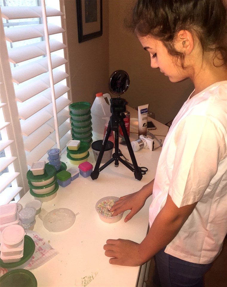 केसी Duke, 14, has created a slime-making factory and studio in her bedroom. She has 40,000 followers on Instagram after four months in the slime business.