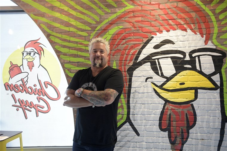 प्रसिद्ध व्यक्ति chef Guy Fieri recently opened his latest restaurant, ChickenGuy!, at Walt Disney World's Disney Springs.