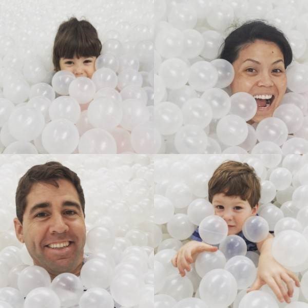 Angie Goff and family playing in a ball pit
