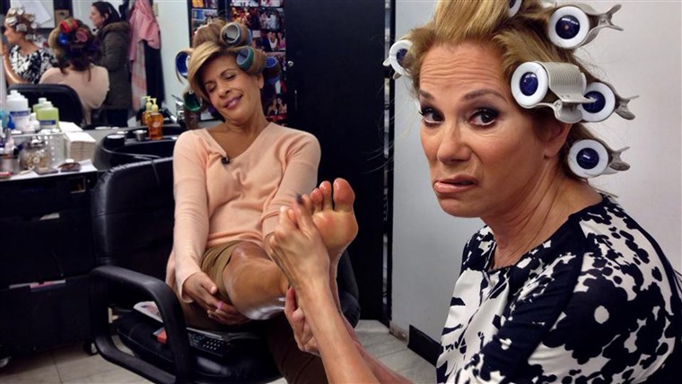 Kathie Lee gives Hoda, one of People's Most Beautiful people, a foot rub. 