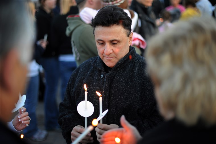 फ्रैंक Deangelis of Columbine High School Principal is in candlelight Vigil to honor and remember those touched by the tragedy at the Columbine Memorial in Clement Park, Littleton, CO. on Sunday. Hyoung Chang, The Denver Post