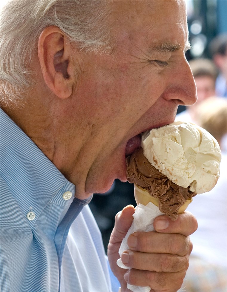 MINKET Vice Presidential nominee Senator Joe Biden eats an ice cream cone at the Windmill Ice Cream in Aliquippa, Pennsylvania, August 29, 2008, whil...