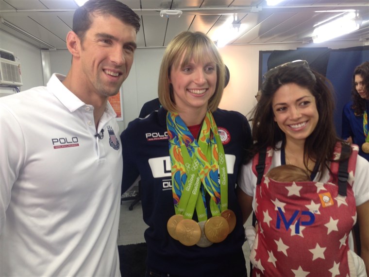 Katie Ledecky, Michael Phelps and Phelps' fiancee, Nicole Johnson