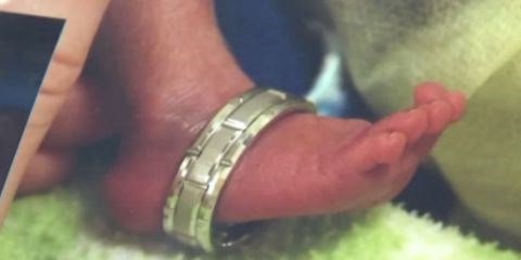 טרבור's foot was so tiny that his dad Bo Frolek was able to slip his wedding ring over it.