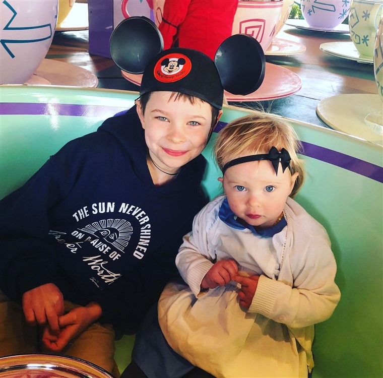 ה Theibault-Dean children on the teacups at Walt Disney World.