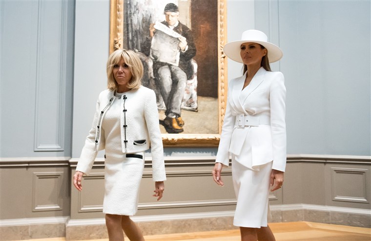 שניהם first ladies both opted for white skirt suits and pumps.