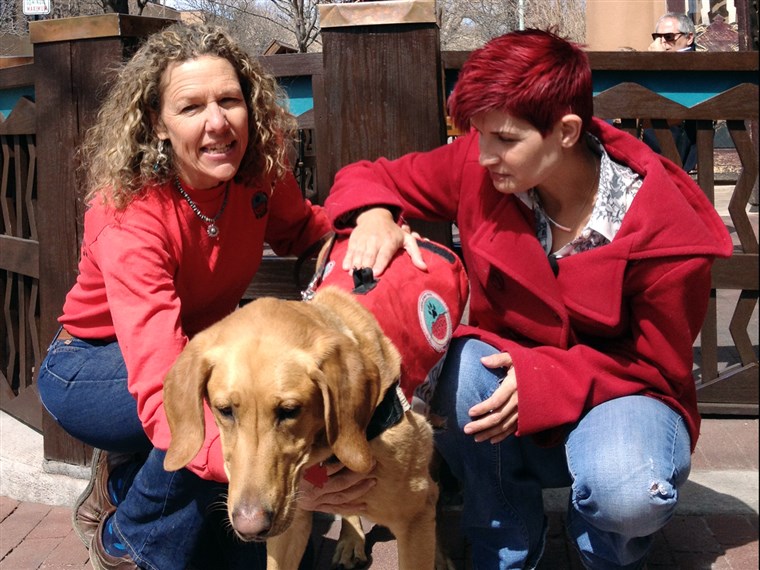 Chanon Thompson, Cindy Oliver and her rescue dog, Callie, reunited in Santa Fe this week.