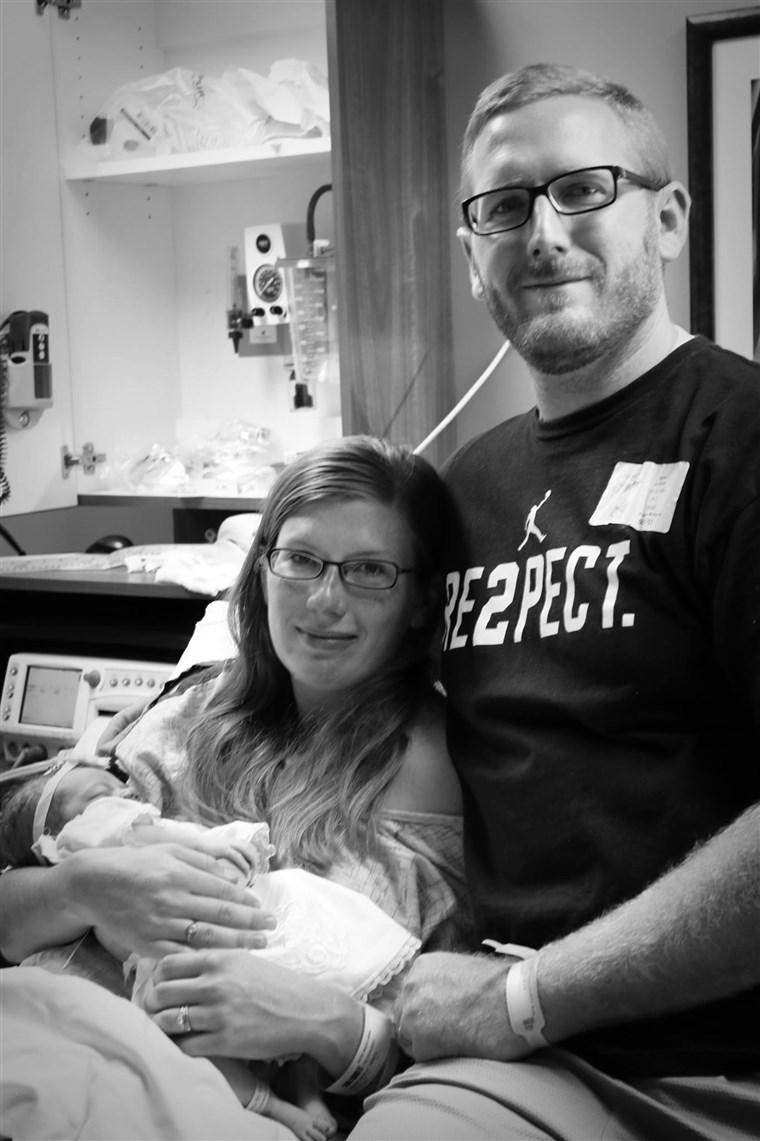נטלי and husband, Brian, with baby Eleanor.