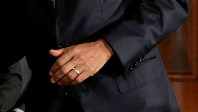 NAS. President Barack Obama's hand with wedding ring