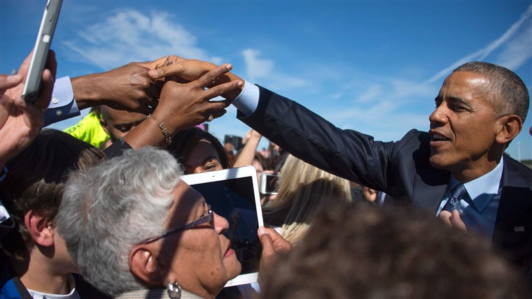 NAS President Barack Obama greets supporters