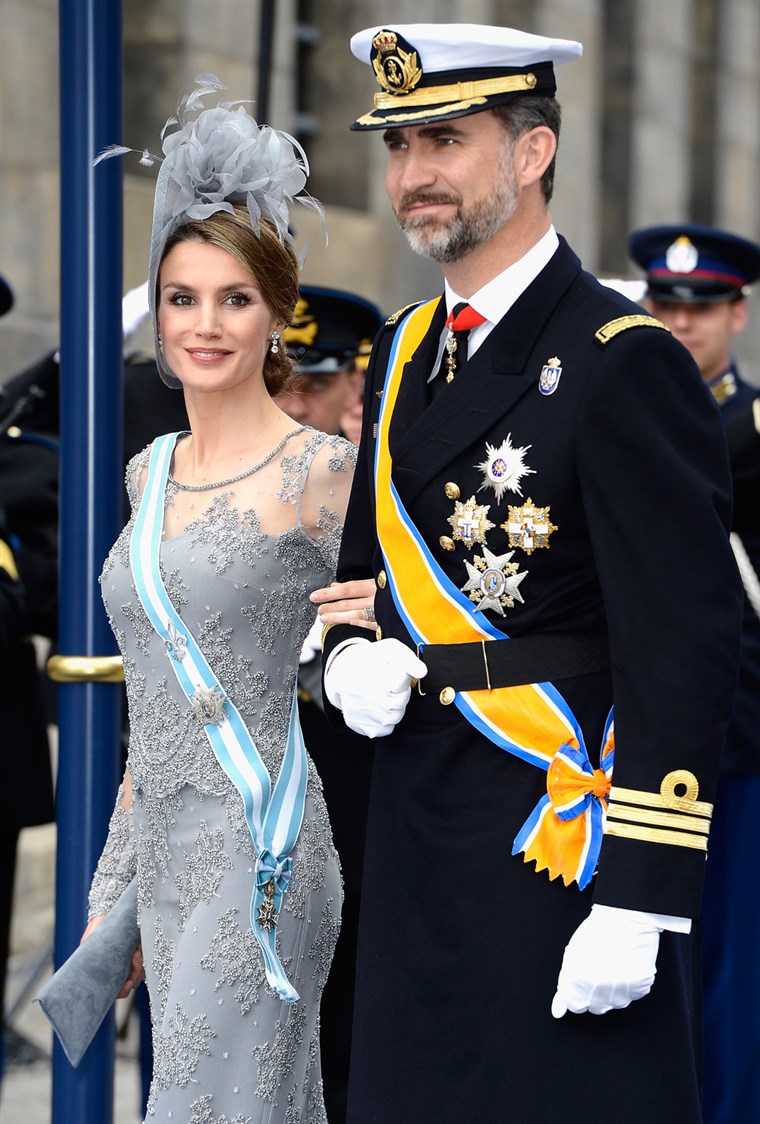 AMSTERDAM, NETHERLANDS - APRIL 30: Princess Letizia of Spain and Prince Felipe of Spain depart the Nieuwe Kerk to return to the Royal Palace after th...
