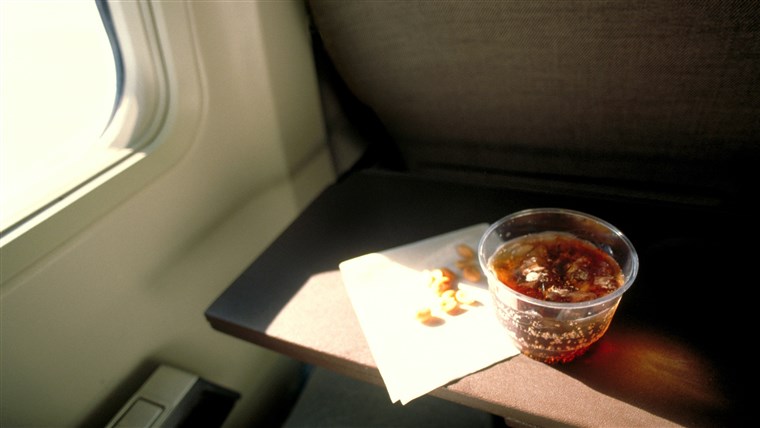 Soda and peanuts on airplane