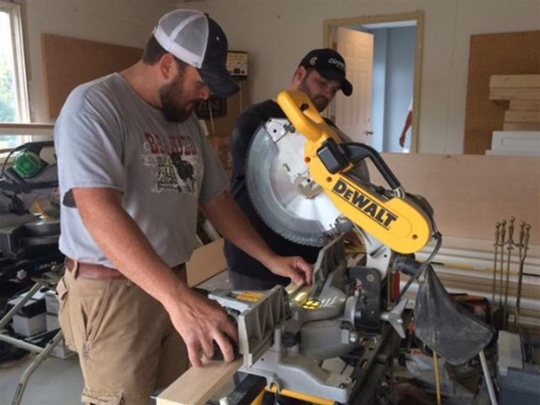 कब they're not going viral, the Singing Contractors' Aaron Gray and Josh Arnett continue to work on home-improvement projects, which sometimes involve cutting trim.