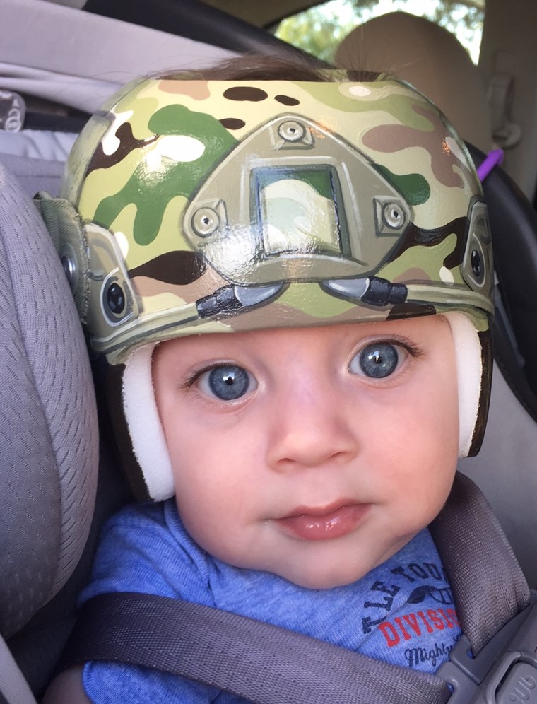 Kao a nod to her husband's service in the army, Lindsey Menard asked Strawn to paint her son, Levi's, helmet with camouflage.