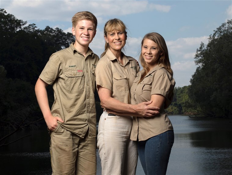 Ez image released by Animal Planet shows the Irwin family, from left, Robert, Terri and Bindi. The Irwin family is returning to television's Animal Planet, 11 years after the death of 