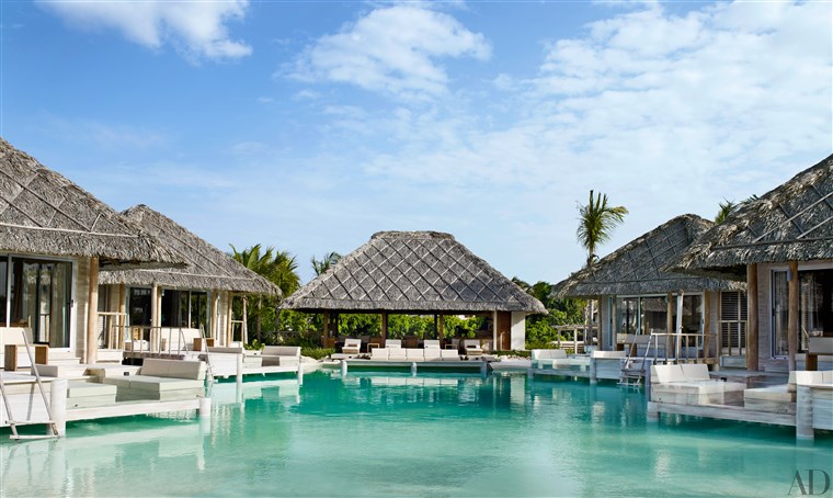 זה sand bottom pool is a refreshing escape for visiting guests.