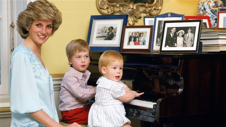 Diana, Princess of Wales with her sons, Prince William and Prince Harry, at the piano in Kensington Palace in 1985.