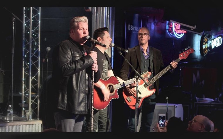 MA's Lester Holt joins The Rascal Flatts on stage at the Diffle and Steel Guitar Grill in Nashville.