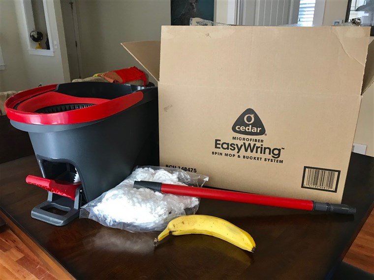 A O-Cedar EasyWring Microfiber Spin Mop and Bucket Floor Cleaning System