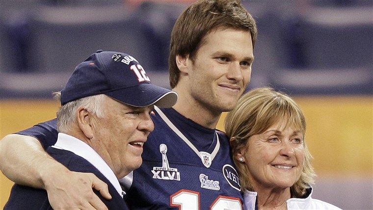 Tomi Brady with his parents