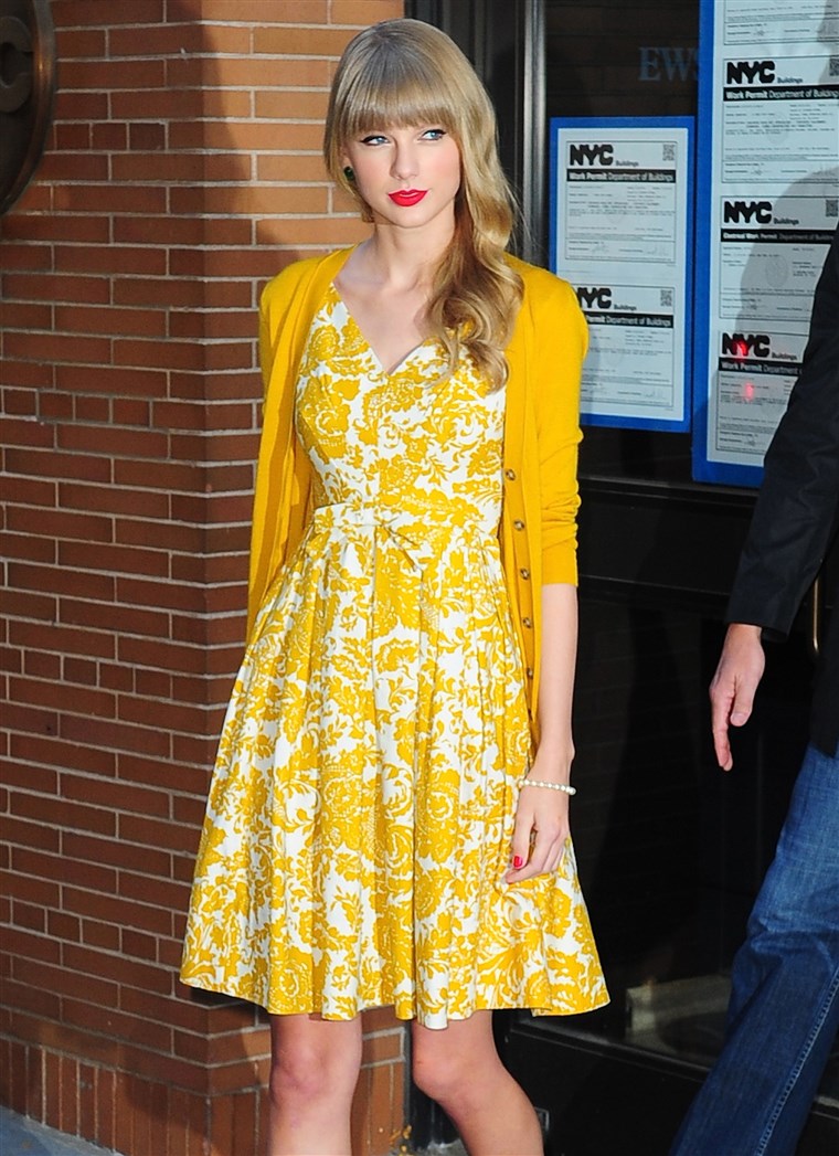 Taylor Swift wears yellow cardigan