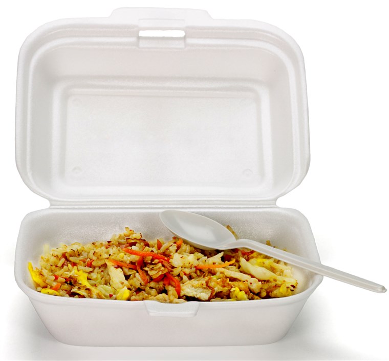 prženi rice in Styrofoam box with plastic disposable spoon