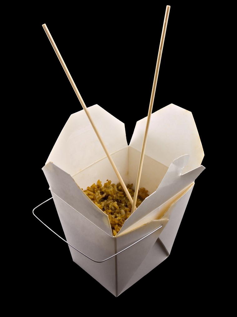 kineski take out in a Chinese food container.