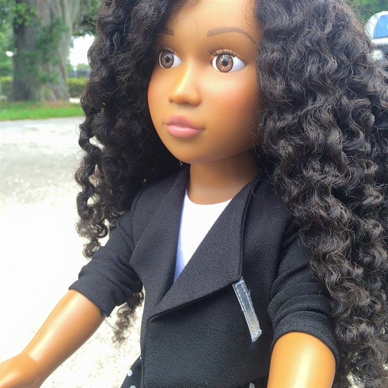  18-inch doll has washable, natural kinky hair.