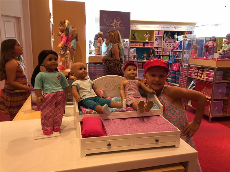 ביילי says her daughter was thrilled to find a trundle bed display at the American Girl store that featured a doll without hair.