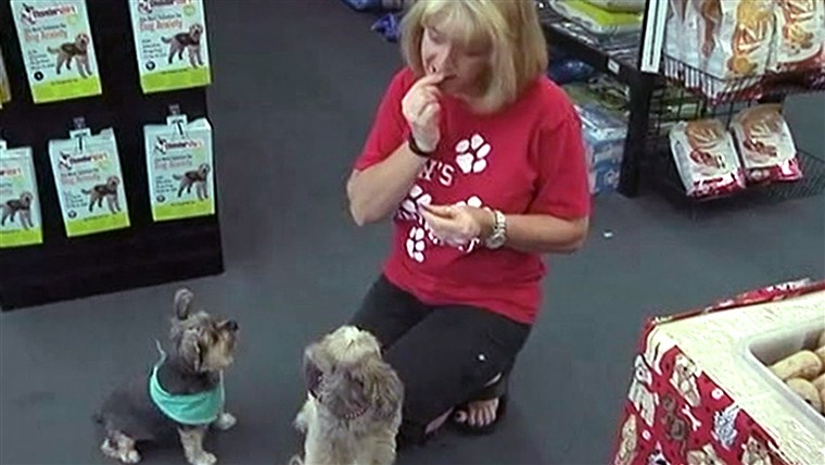 ה pet food store owner is trying to demonstrate how healthy her products are.